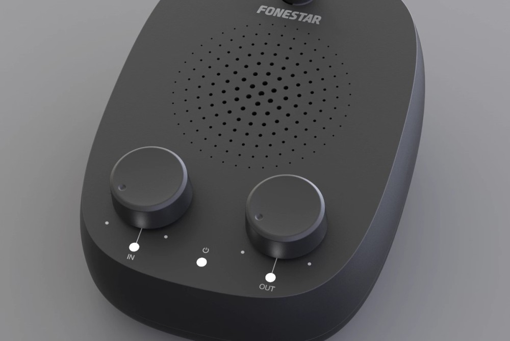 Una unidad de intercomunicación Fonestar gris con rejilla de altavoz circular, dos perillas de control grandes y luces.