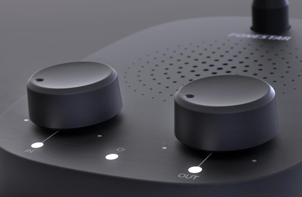 Dispositivo de audio negro con dos mandos, rejilla de altavoz e indicadores LED iluminados.