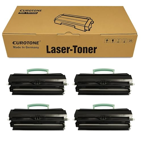 Eine Eurotone Laser-Toner Box oben und vier schwarze Lasertoner mit grünen Griffen unten vor weißem Hintergrund.