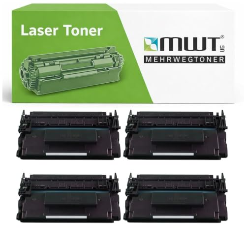 Vier schwarze Lasertoner-Kartuschen vor einer weißen und grünen MWT Mehrwegtoner Verpackung.