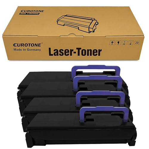 Vier schwarze Eurotone Laser-Toner Kartuschen mit violetten Griffen vor einem braunen Karton.