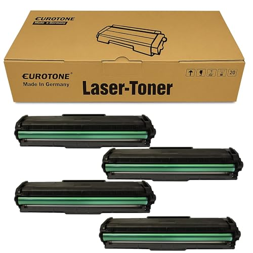 Vier schwarze Lasertoner mit grünen Walzen und ein dazugehöriger brauner Eurotone Karton.