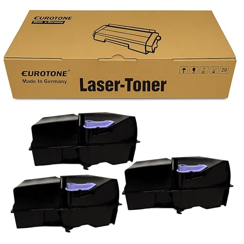 Eine offene braune Schachtel mit der Aufschrift Eurotone Laser-Toner neben drei schwarzen Tonerkartuschen.