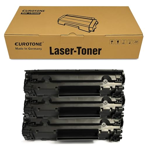Eine braune Eurotone Laser-Toner Box und vier schwarze Tonerkassetten.
