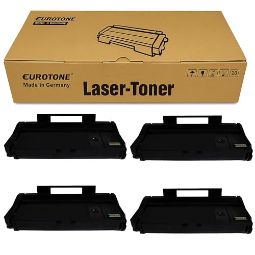 Eine braune Eurotone Laser-Toner Schachtel und vier schwarze Lasertoner.