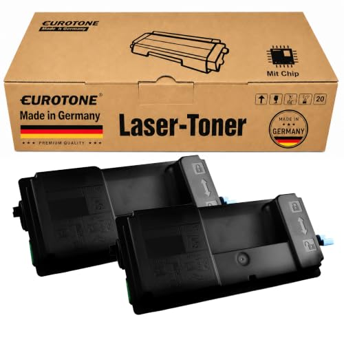 Zwei schwarze Lasertoner-Kartuschen vor einer braunen Eurotone-Verpackungsbox.
