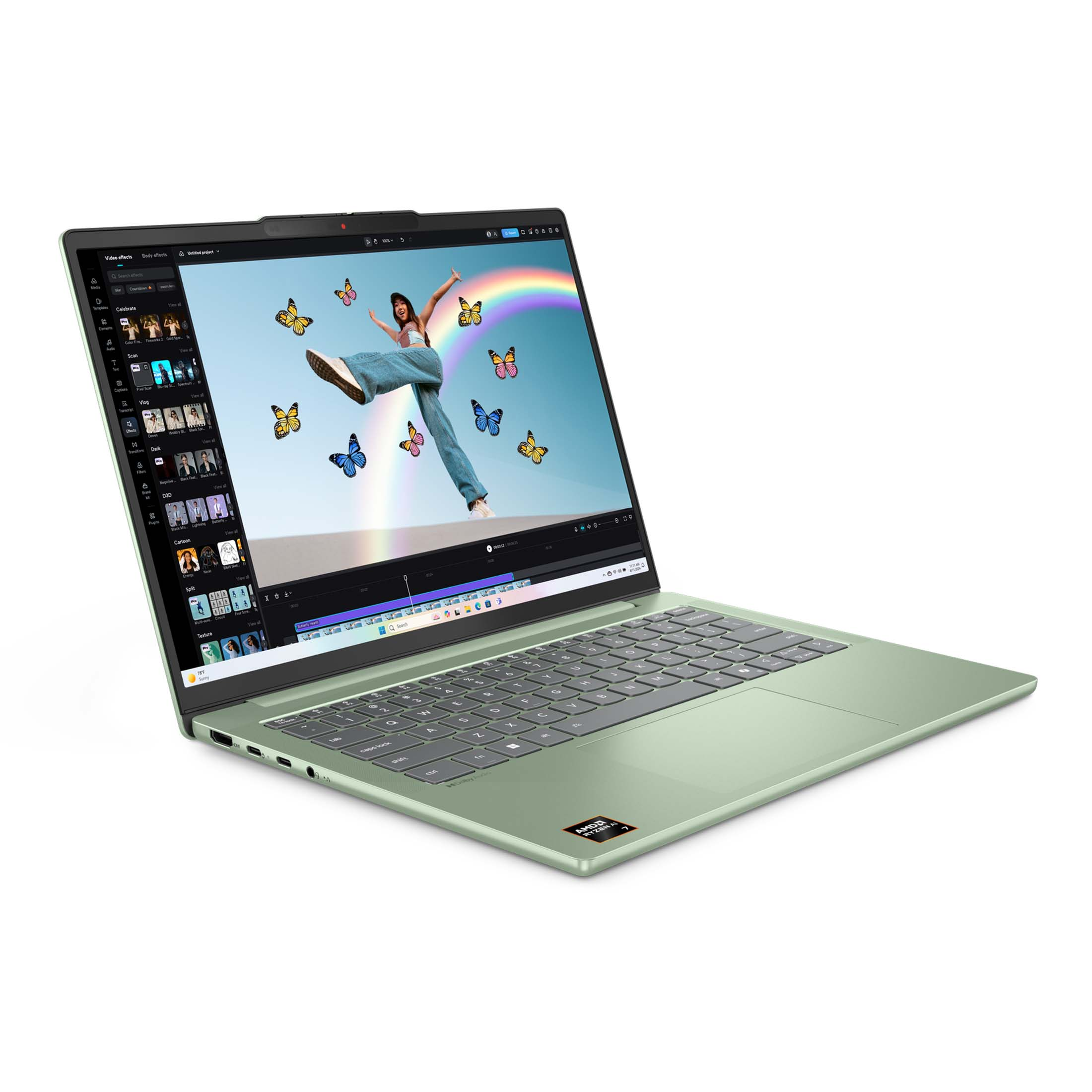 Ein mintgrüner Laptop zeigt einen Videobearbeitungsbildschirm mit einer tanzenden Person und Schmetterlingen.