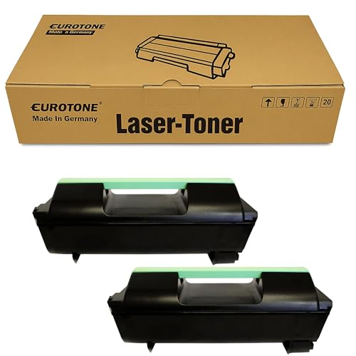 Zwei schwarze Lasertoner mit grünem Griff vor einer Eurotone-Kartonverpackung.
