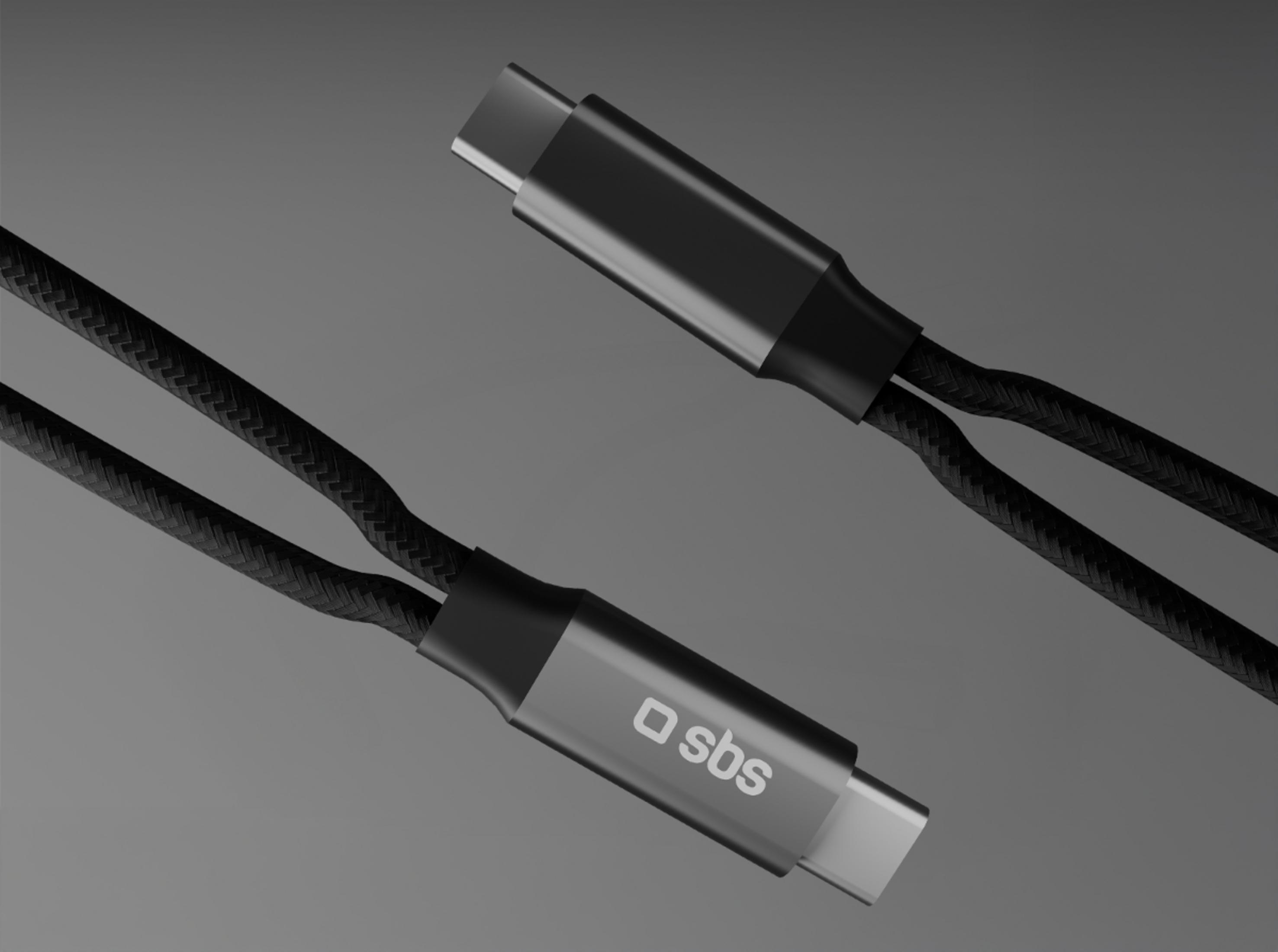Dos cables USB-C trenzados negros con conectores plateados y el logotipo de sbs sobre fondo gris.