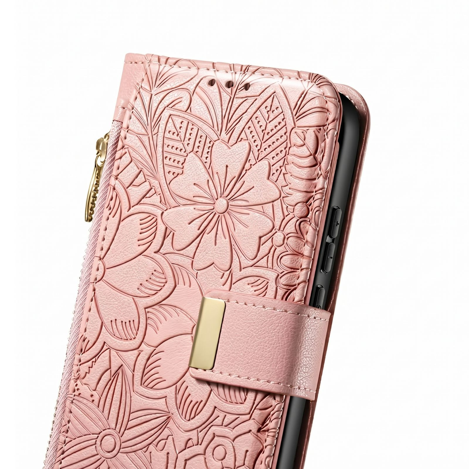 Eine rosa Handytasche aus Leder mit geprägten Blumenmustern, einem Goldverschluss und einem Reißverschluss.