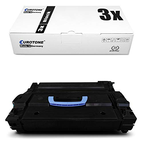 Eine schwarze Tonerkassette mit blauem Griff und die dazugehörige weiße Verpackung.