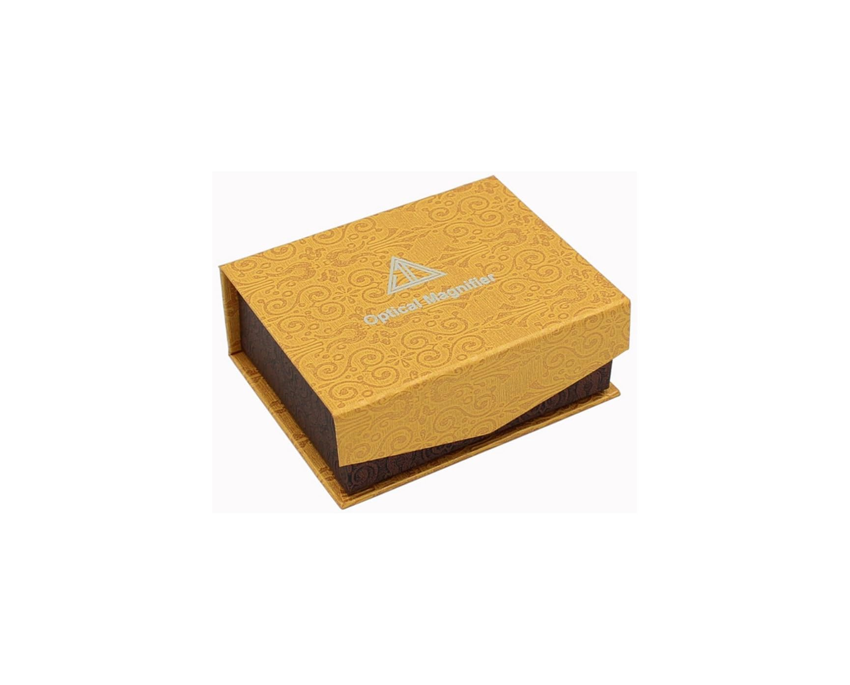 Eine dekorative goldene Box mit filigranen Mustern und dem Aufdruck "Optical Magnifier" auf dem Deckel.
