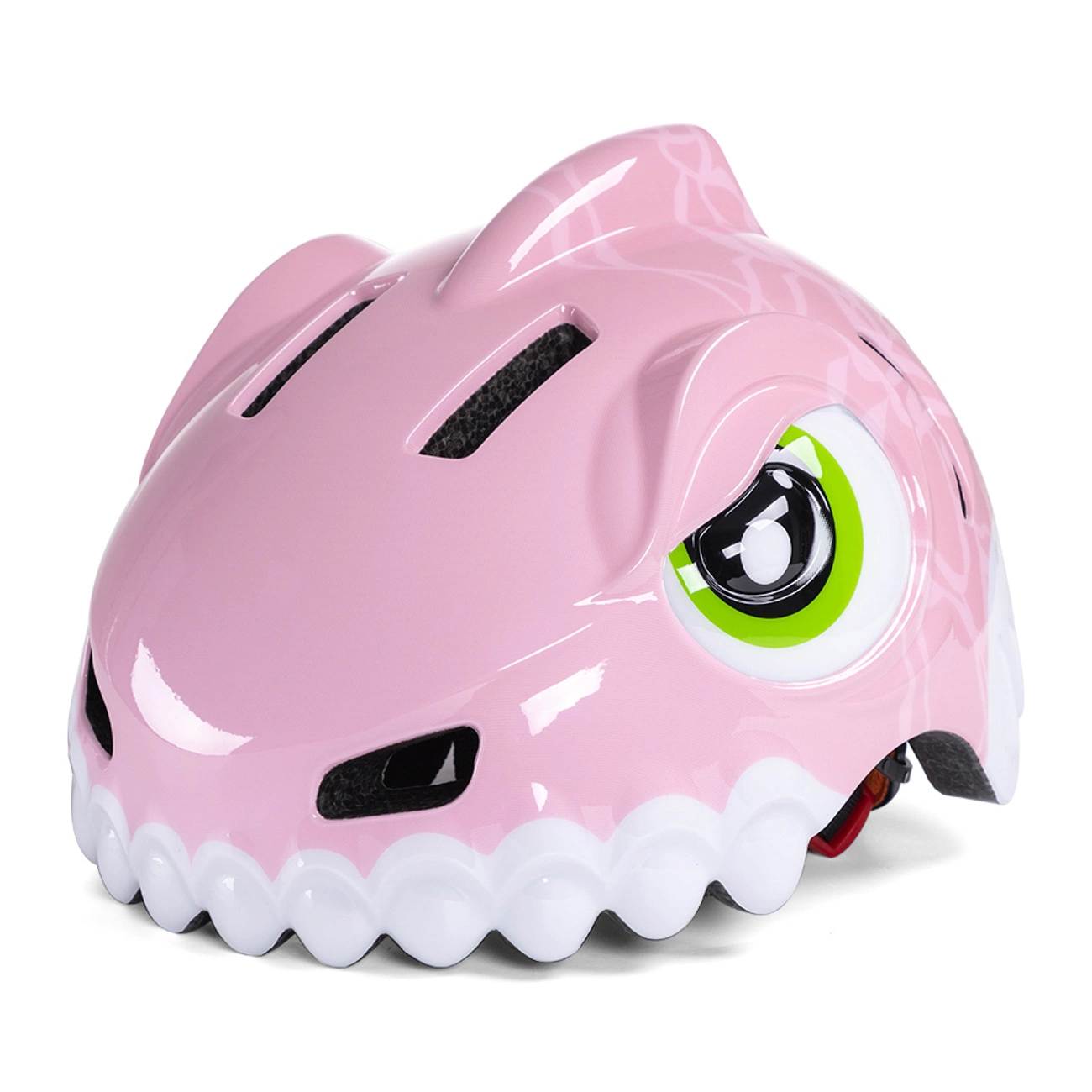 Un casco da bicicletta per bambini rosa con design a squalo, denti bianchi in basso e grandi occhi verdi sul lato.