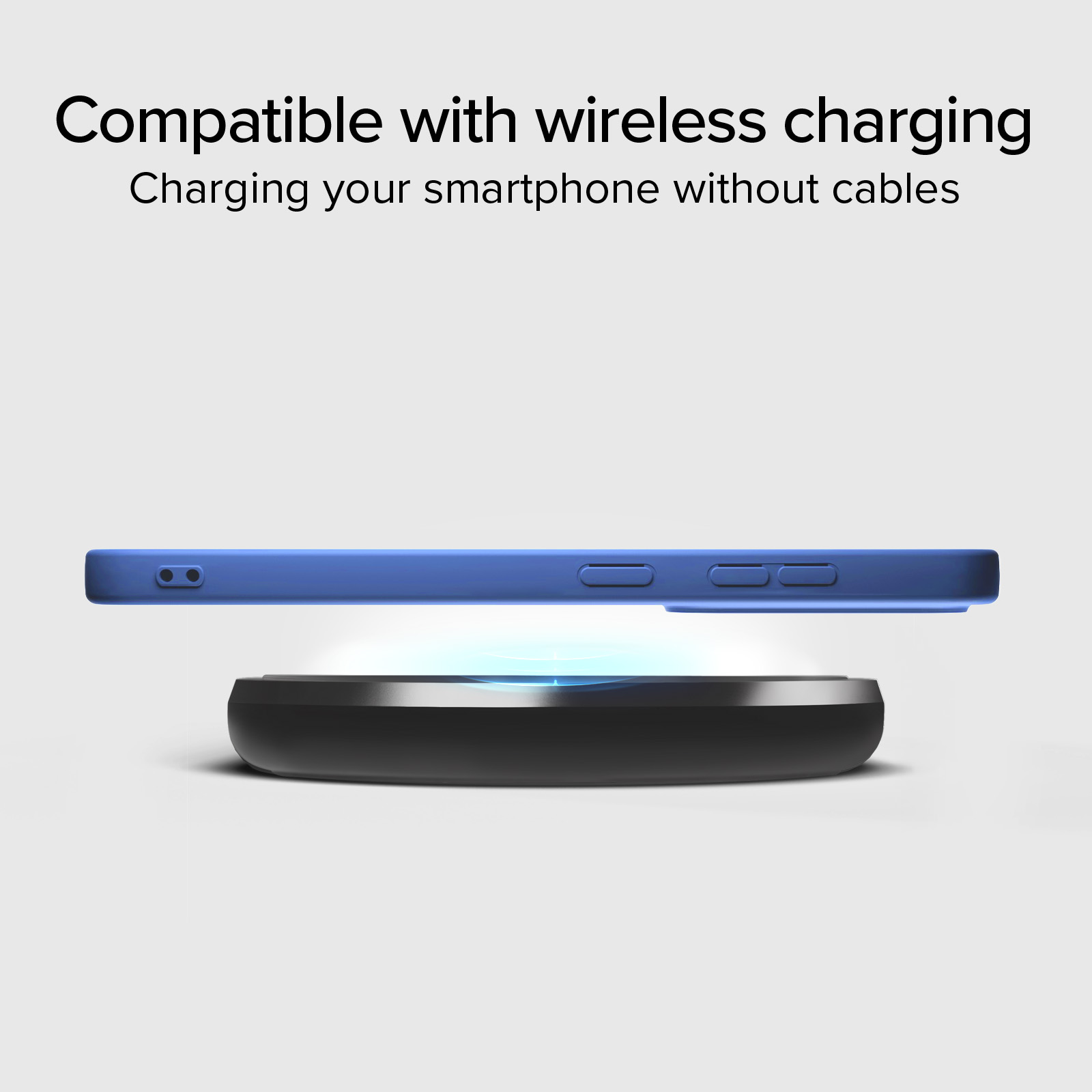 Ein blaues Smartphone schwebt kabellos über einer runden, schwarzen Ladestation auf hellem Grund.