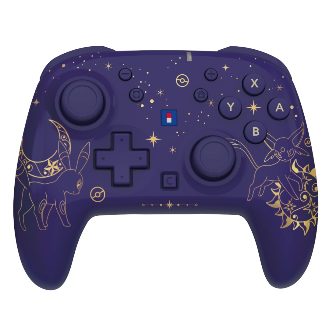 Ein lila Gamecontroller, verziert mit goldenen Sternen und Espeon-Illustrationen.