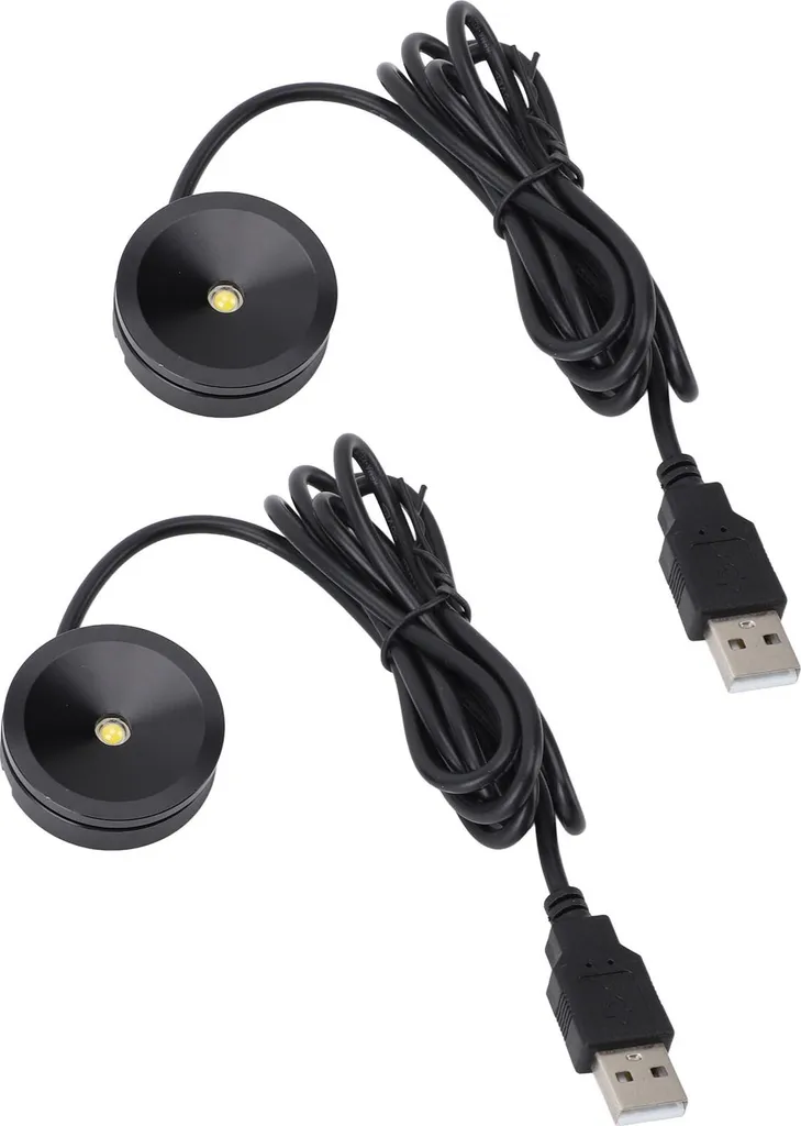 Zwei runde, schwarze LED-Leuchten mit Spiralkabeln und USB-Anschlüssen vor weißem Hintergrund.