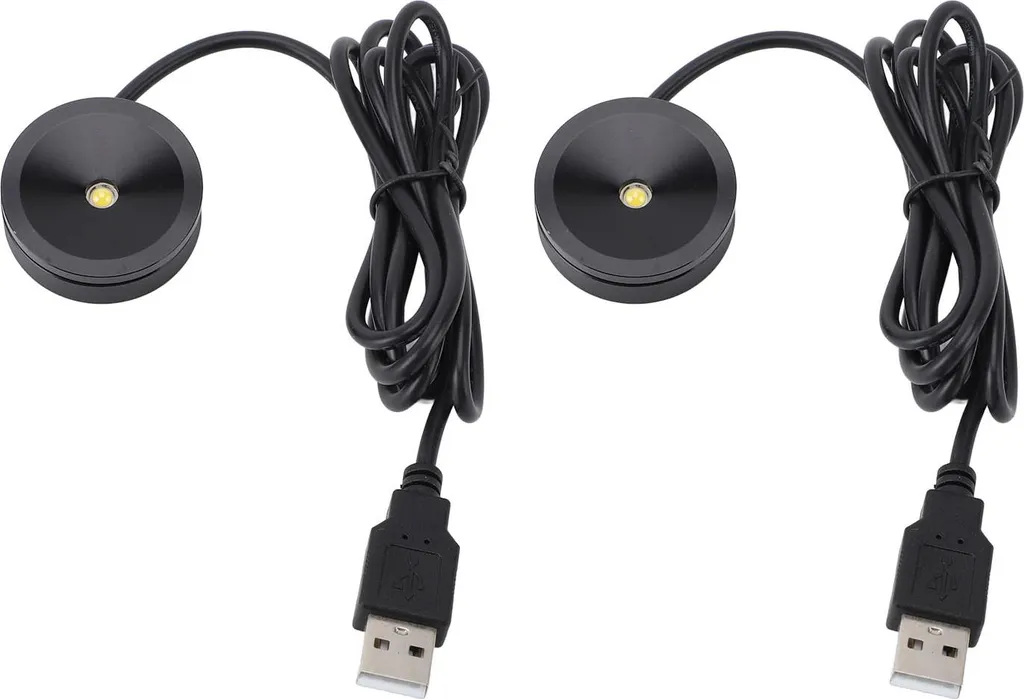 Zwei runde schwarze LED-Lampen mit Kabel und USB-Anschluss.