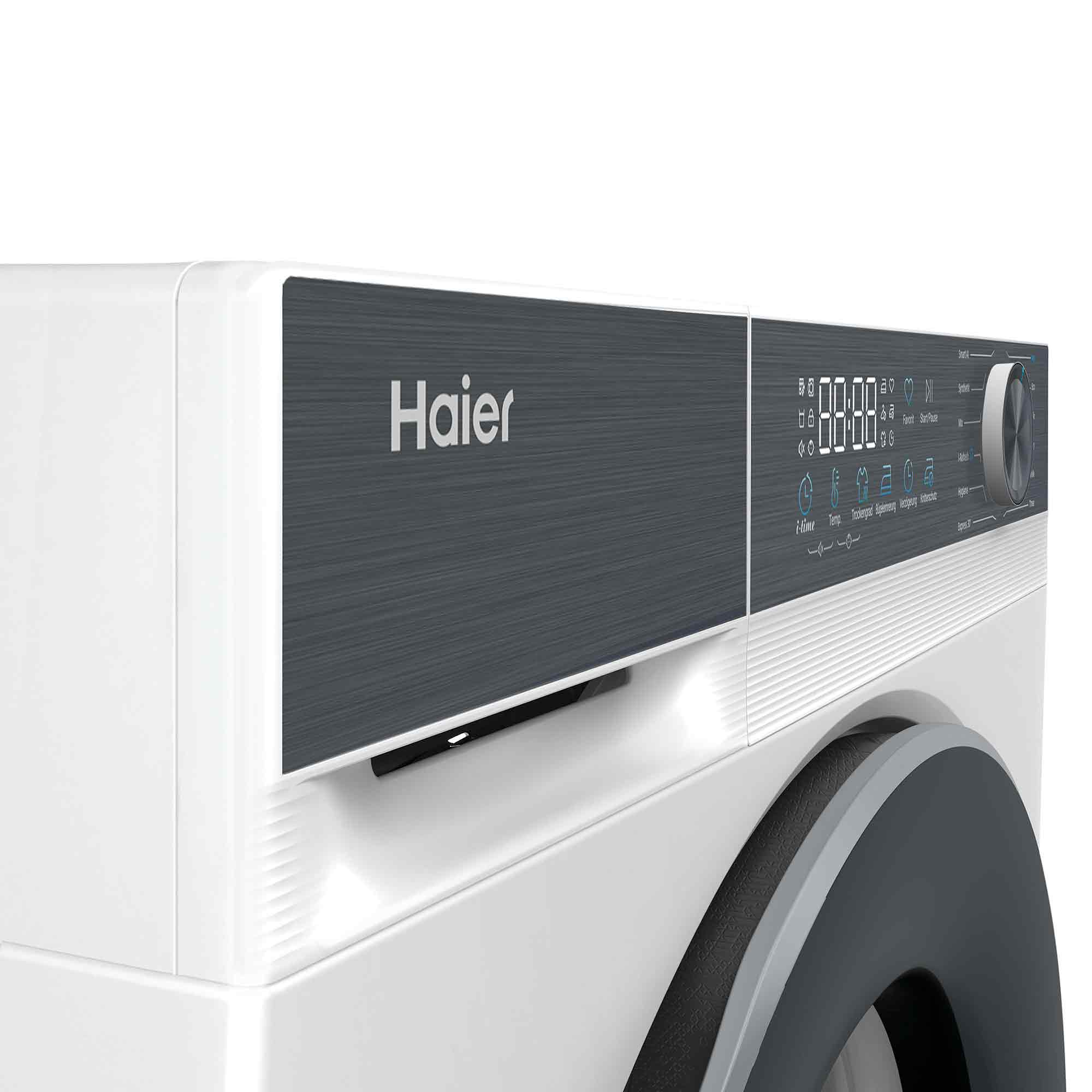 Nahaufnahme einer weißen Haier Waschmaschine mit dunklem Bedienfeld und Drehregler.