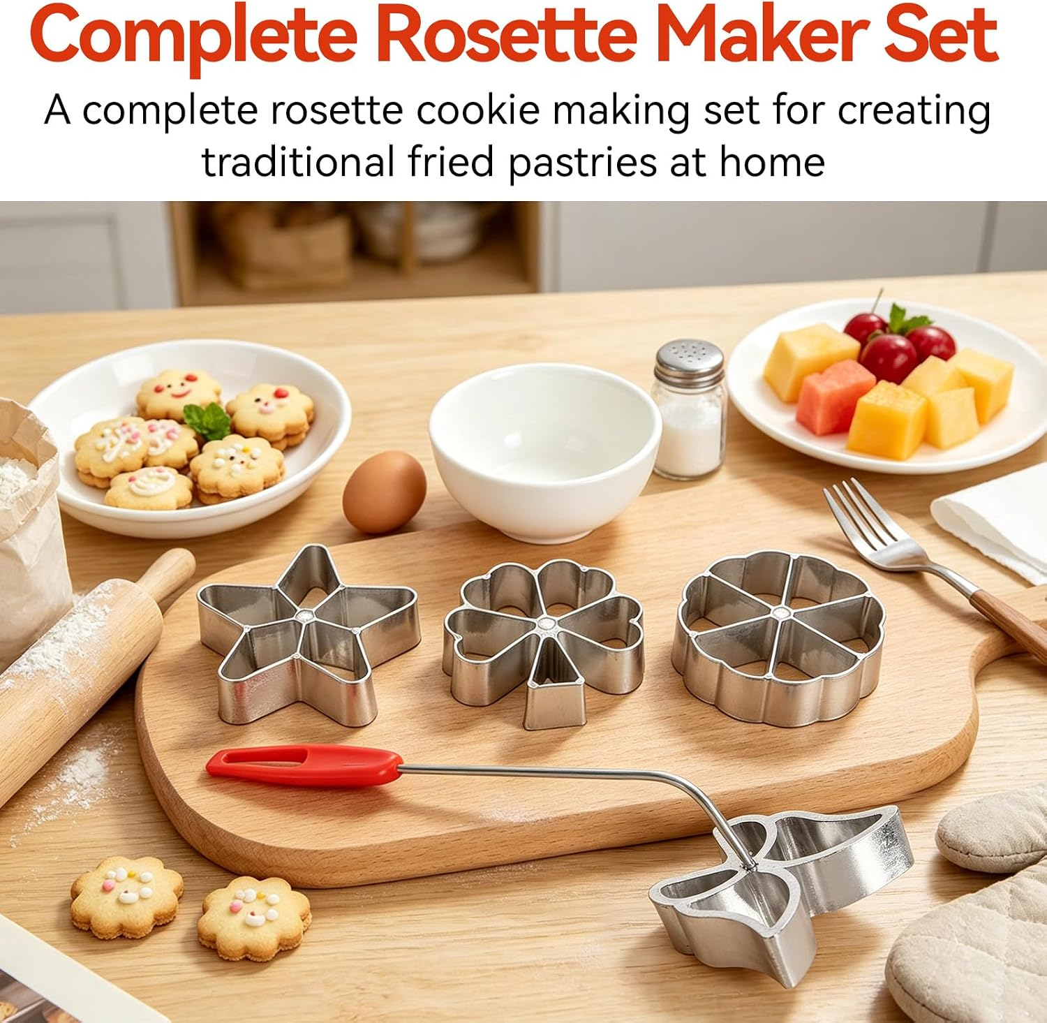 Komplettes Rosetten-Keksmacher-Set mit Formen auf Holztisch.