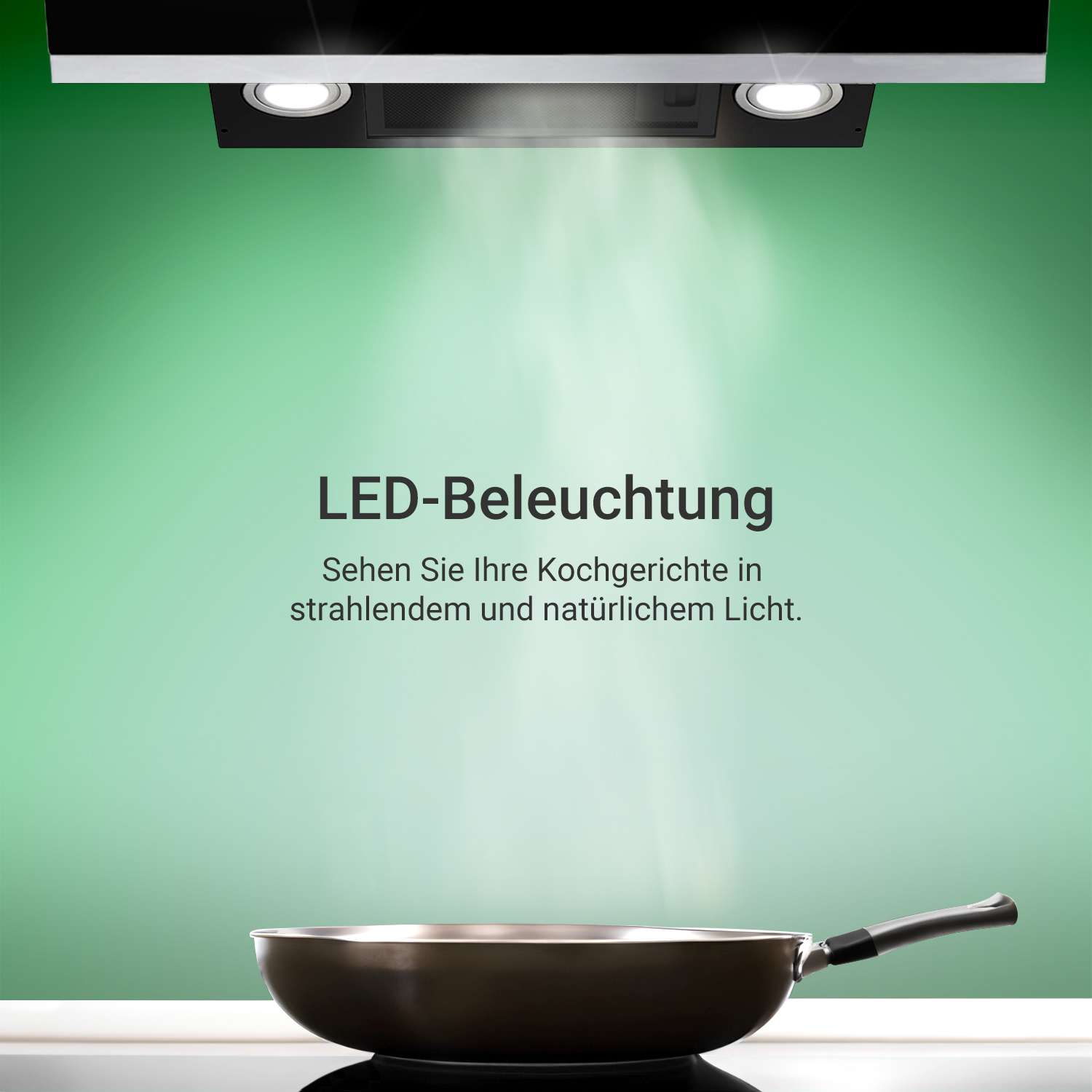 Una cappa aspirante con luci LED sopra un piano cottura con padella su parete verde.