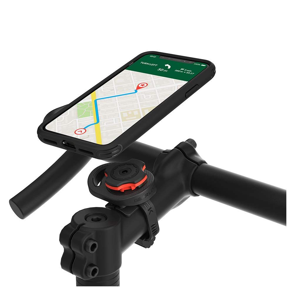 Uno smartphone montato sul manubrio di una bicicletta che mostra la navigazione GPS.