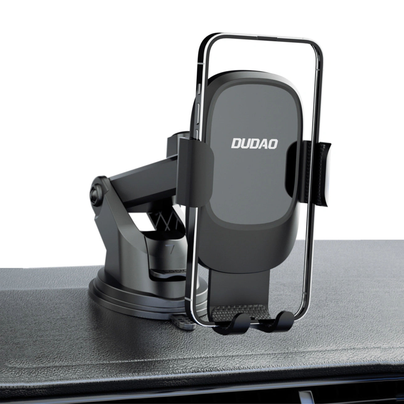 Un supporto per telefono da auto nero con ventosa e uno smartphone finto su un cruscotto.