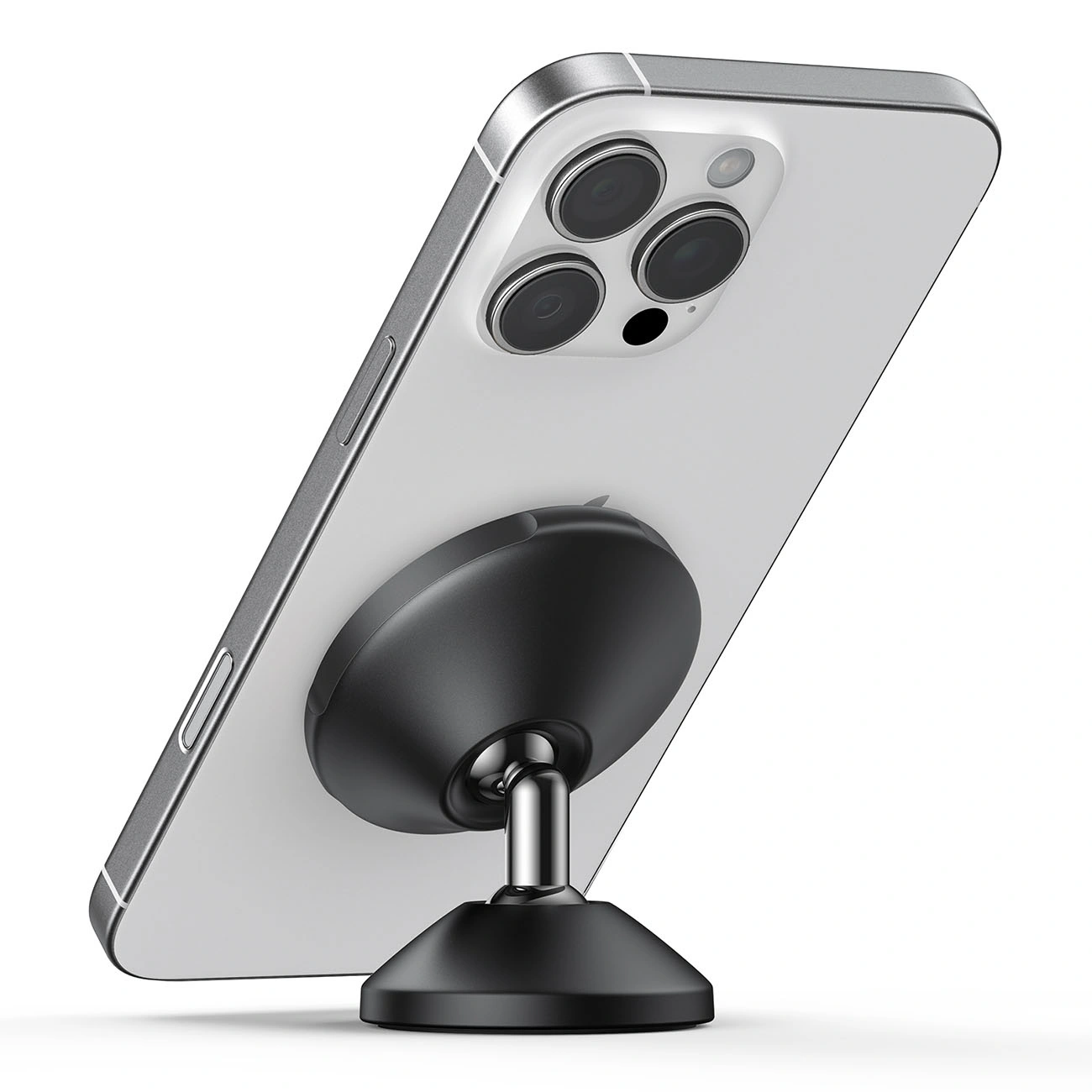 Uno smartphone è fissato su un supporto magnetico rotondo.