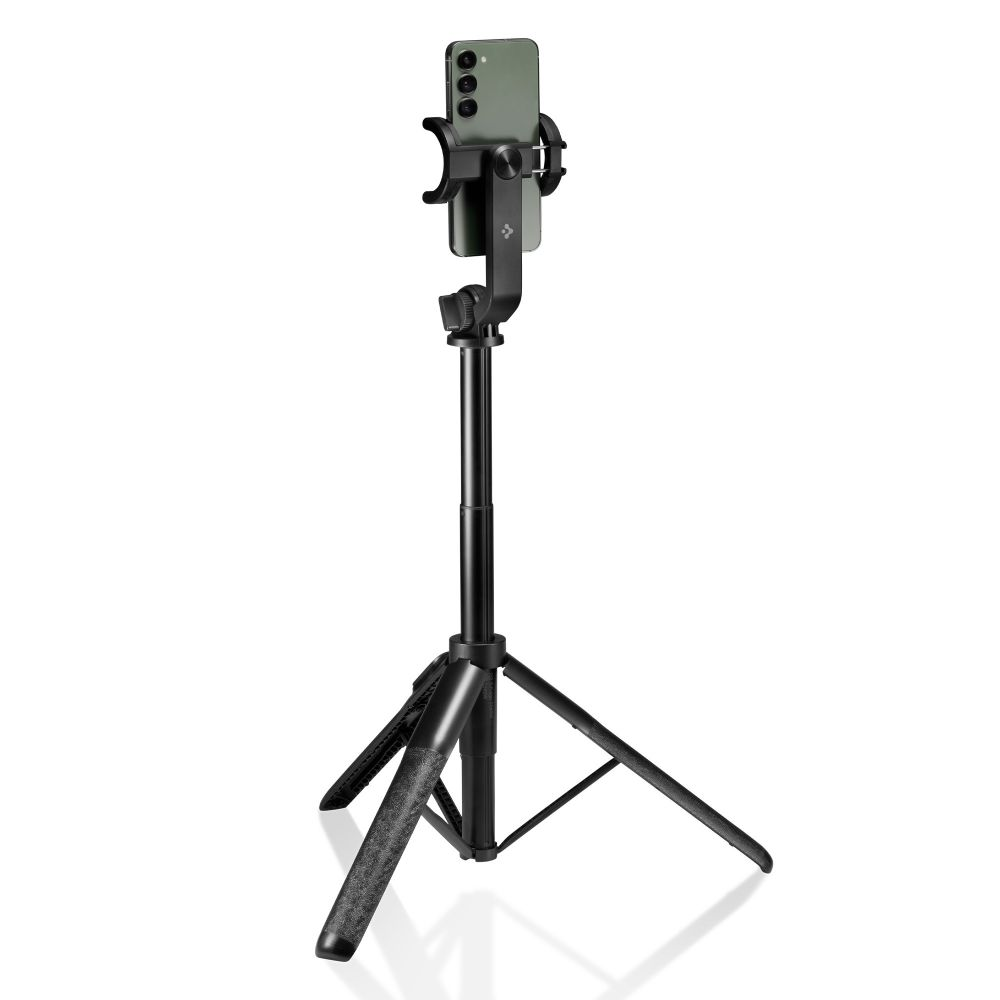 Un treppiede nero con supporto regolabile sostiene uno smartphone verde su sfondo chiaro.