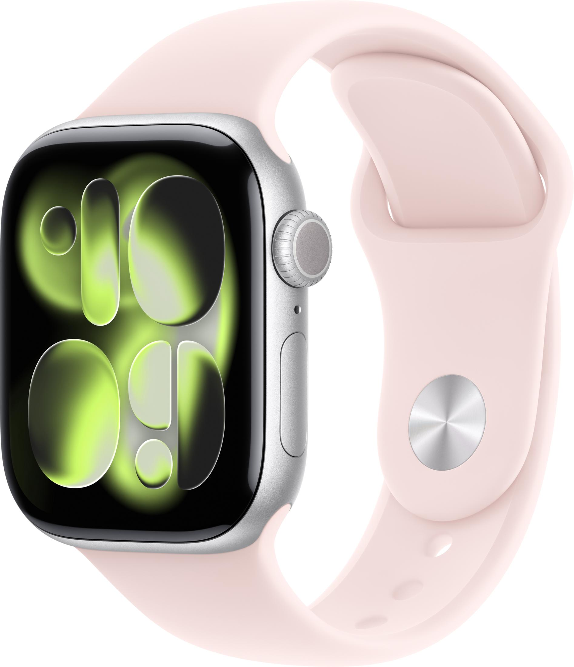 Un Apple Watch con cassa argento e cinturino in silicone rosa chiaro mostra uno schermo verde astratto.