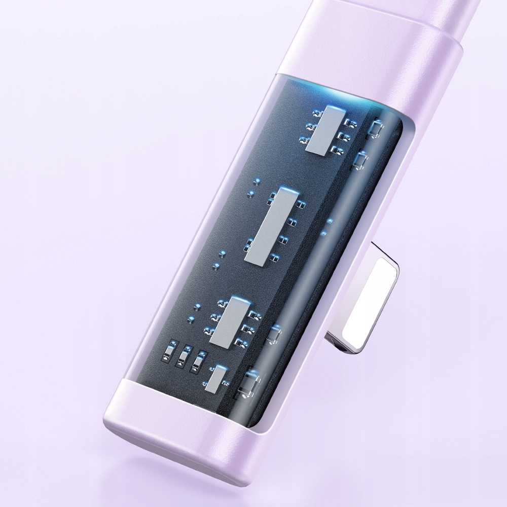 Primo piano di un dispositivo elettronico viola chiaro con una copertura trasparente che mostra la scheda e i microchip.