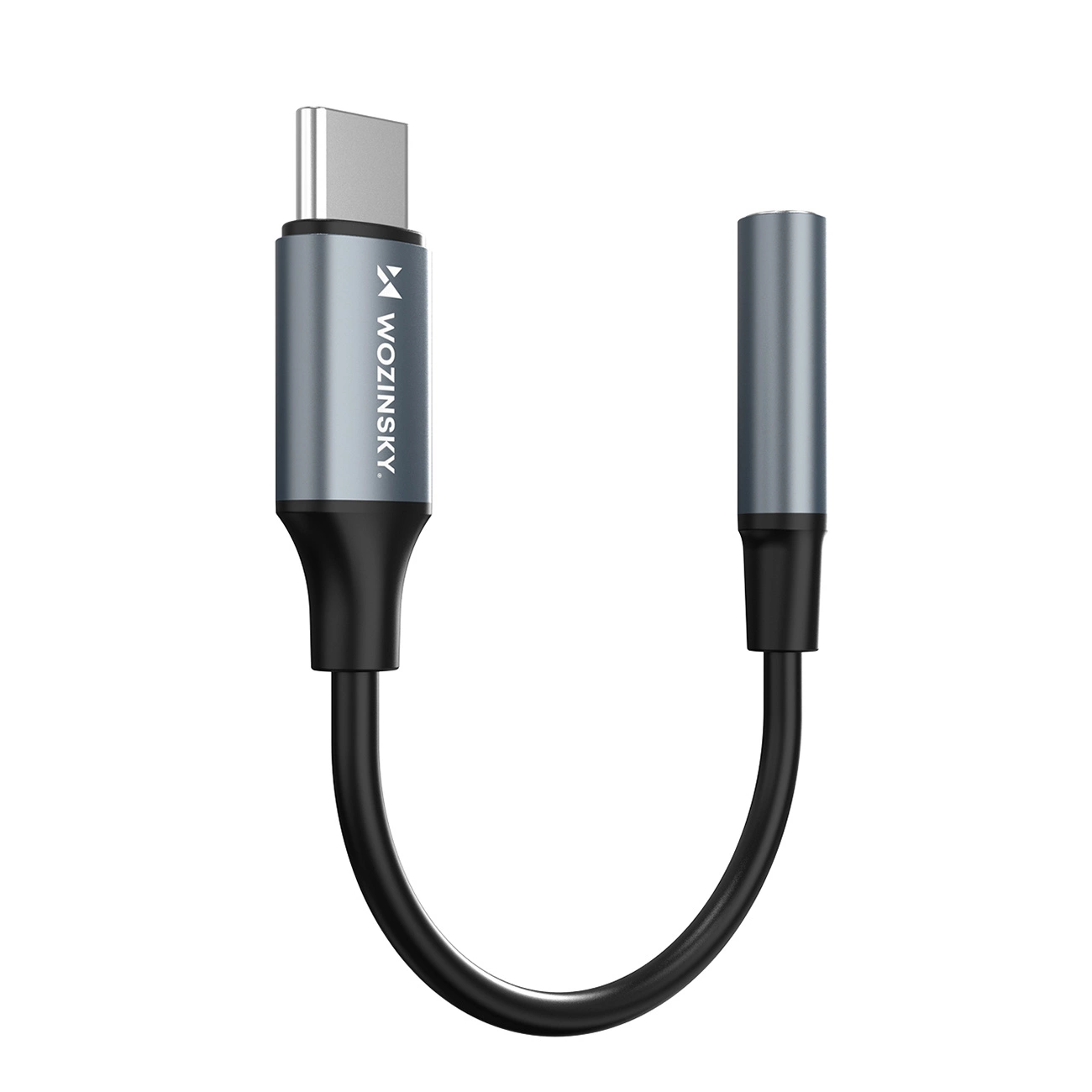 Un adattatore audio da USB-C a 3,5 mm grigio con cavo nero su sfondo bianco.