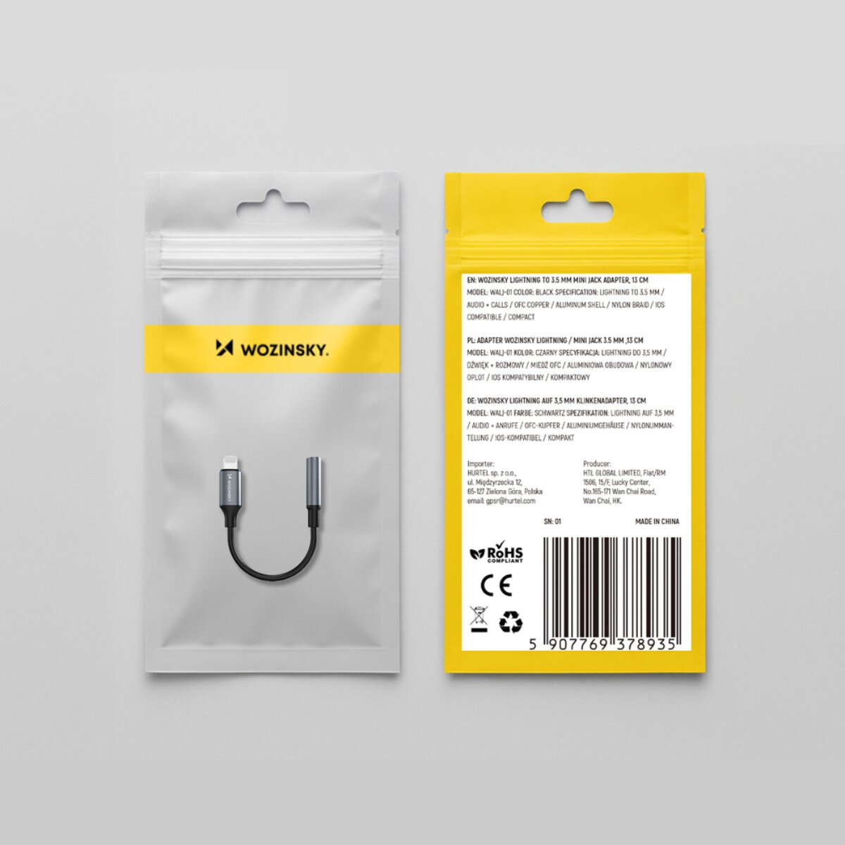 Adattatore da Wozinsky Lightning a jack da 3,5 mm in confezione trasparente con marchio giallo e dettagli del prodotto sul retro.