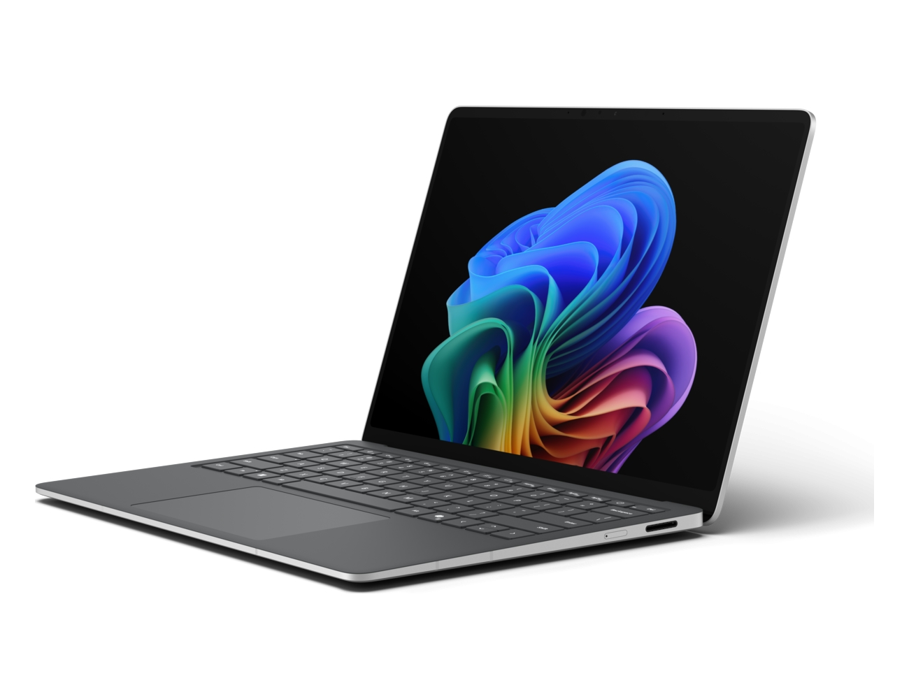 Un laptop argento su sfondo bianco mostra un motivo a onde colorate sullo schermo nero.
