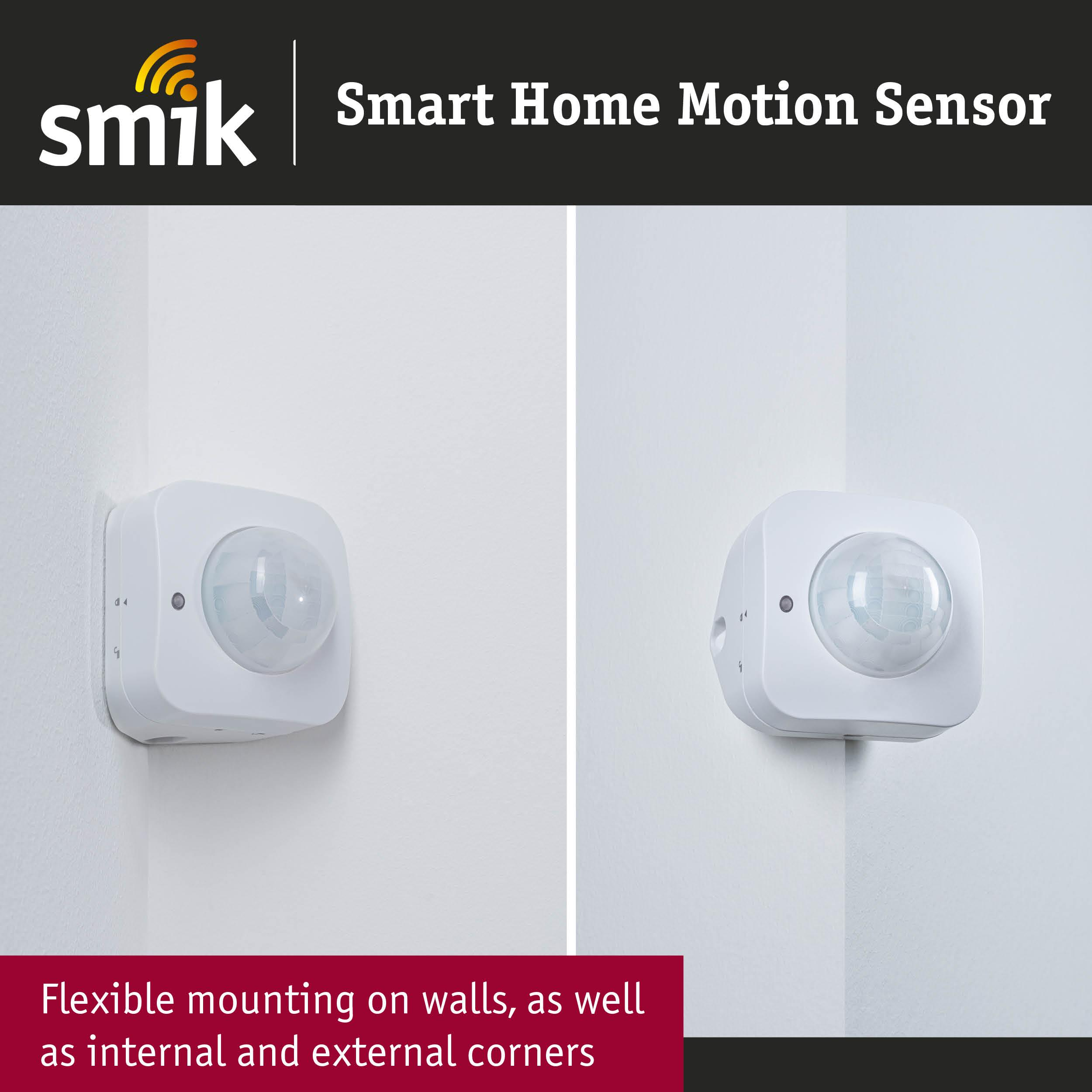 Biały czujnik ruchu smart home Smik zamontowany na ścianie i w rogu.