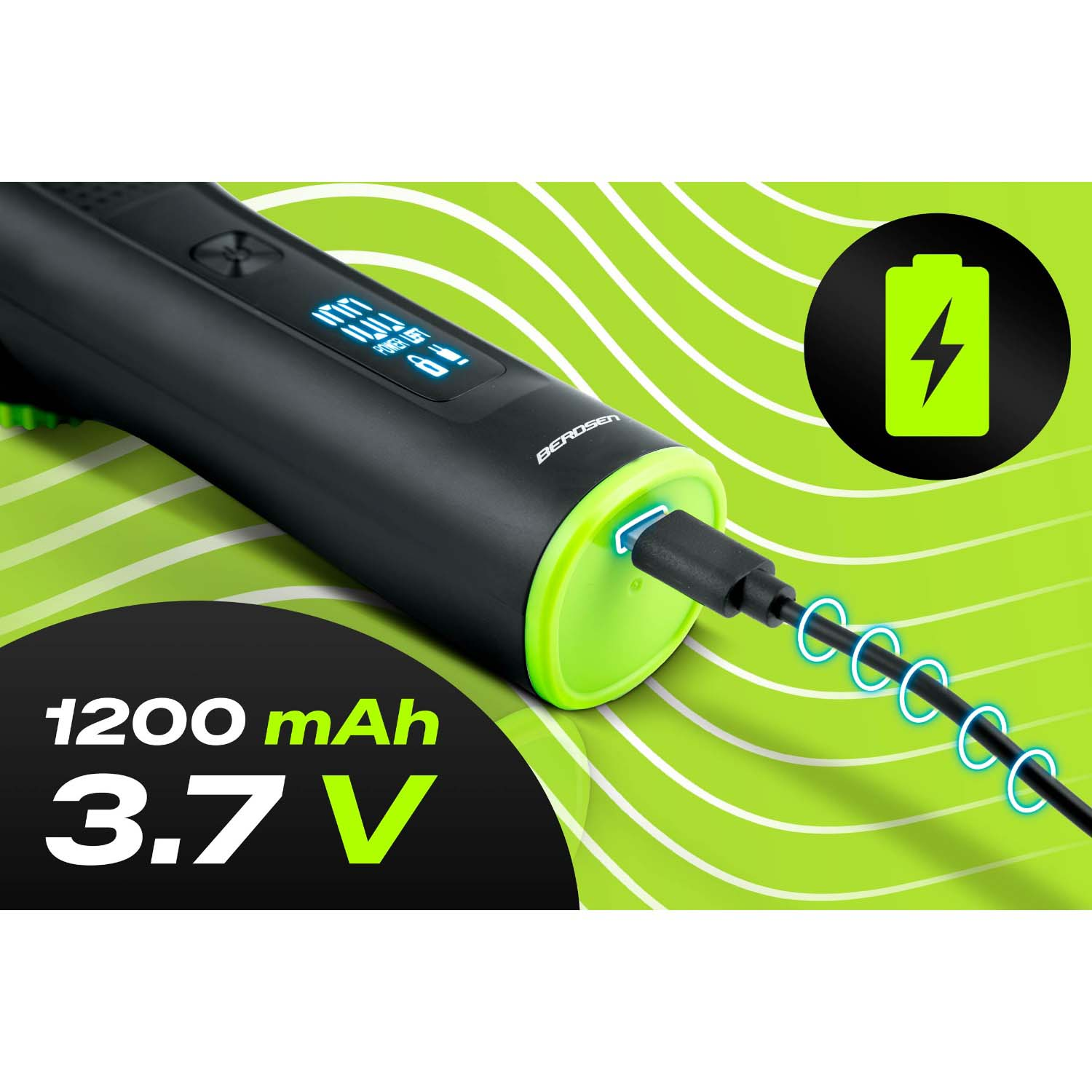 Czarna maszynka ładuje się czarnym kablem na zielonym tle, tekst pokazuje 1200 mAh i 3,7 V.