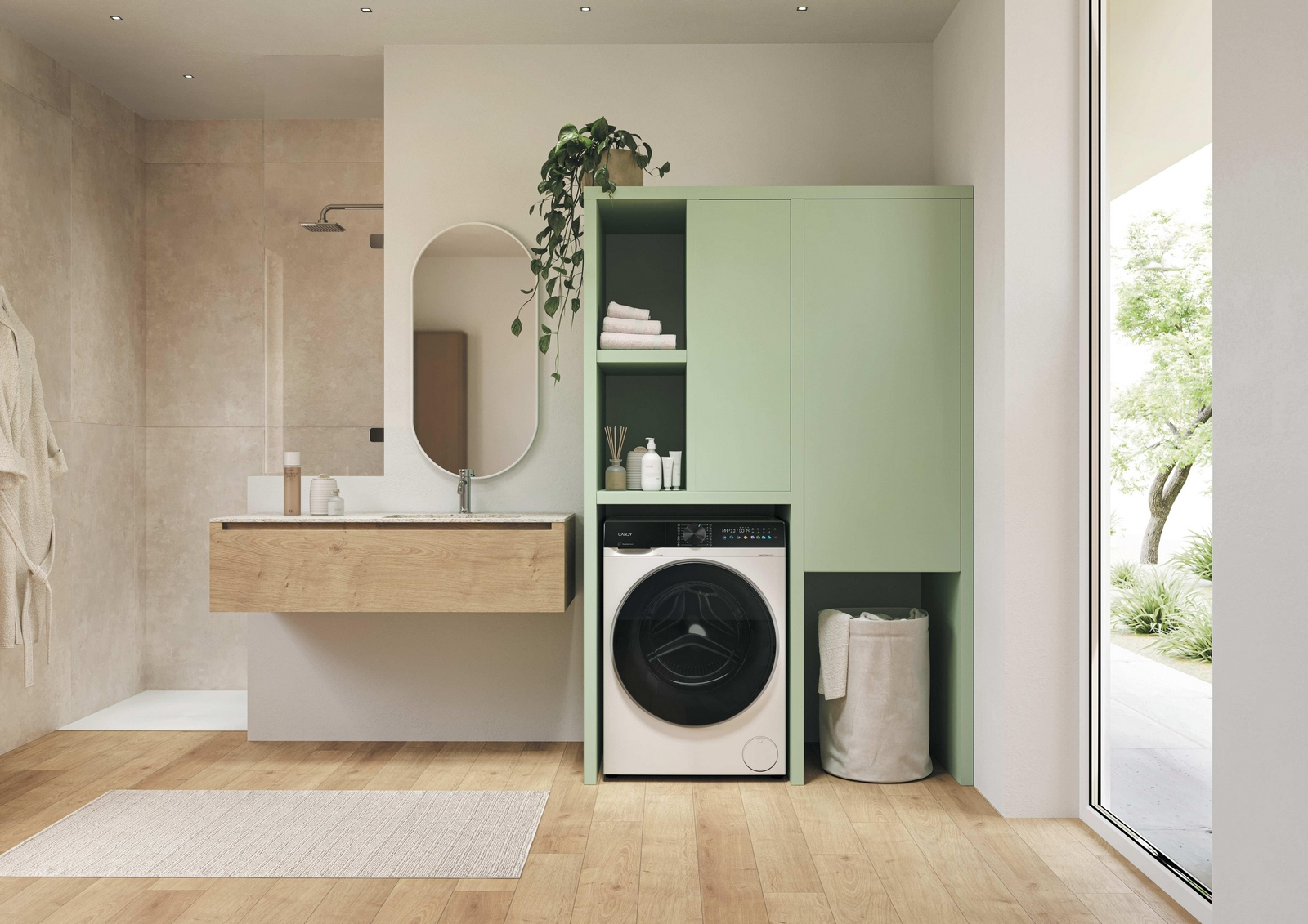 Un bagno moderno con pavimenti in legno, mobili verdi, una lavatrice, uno specchio ovale e una doccia aperta.