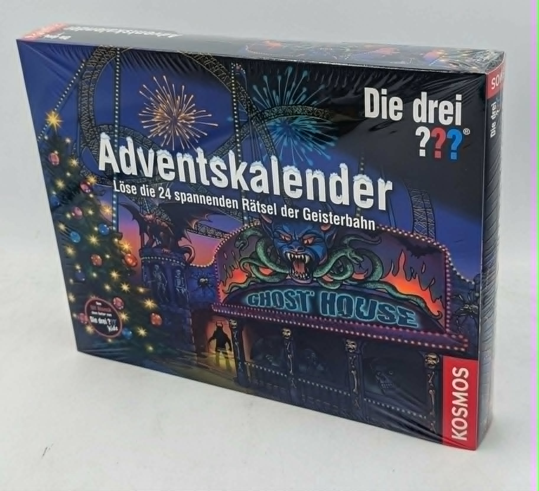Verpackung des Die drei ??? Adventskalenders Ghost House mit gruseliger Geisterbahn-Grafik.