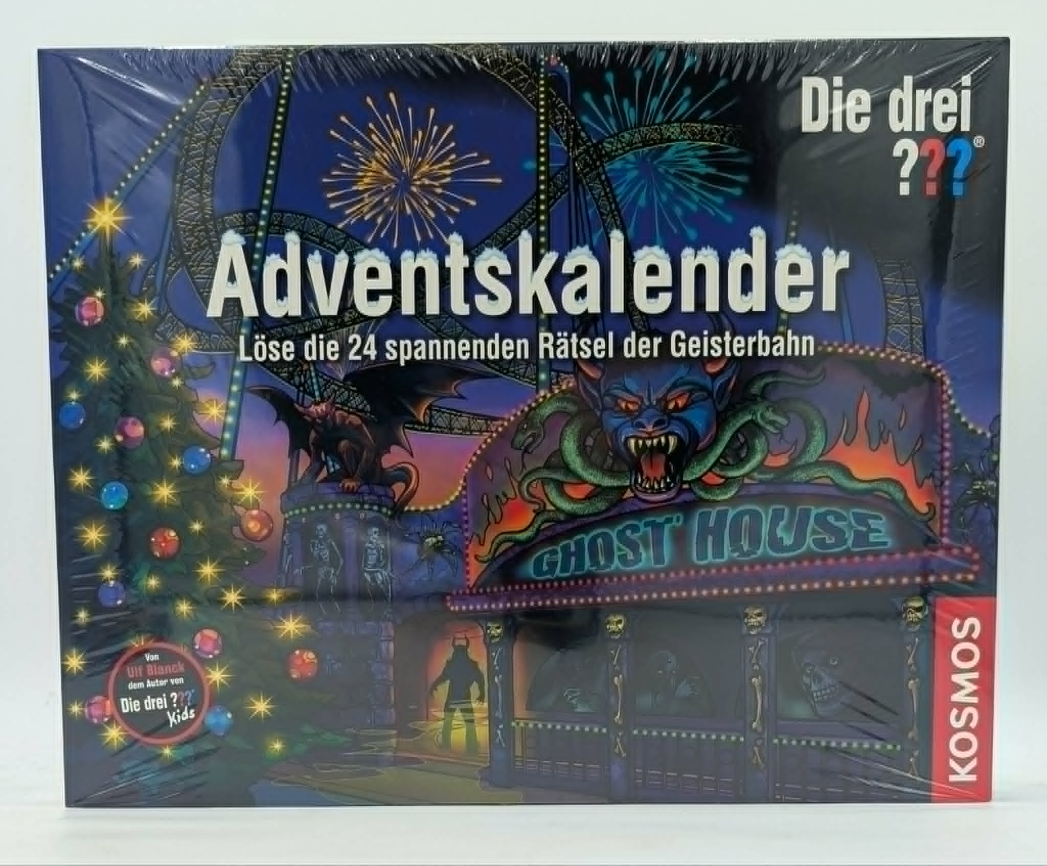 Die drei Fragezeichen Adventskalender Spielschachtel mit Geisterhaus-Thema und Freizeitpark-Hintergrund.