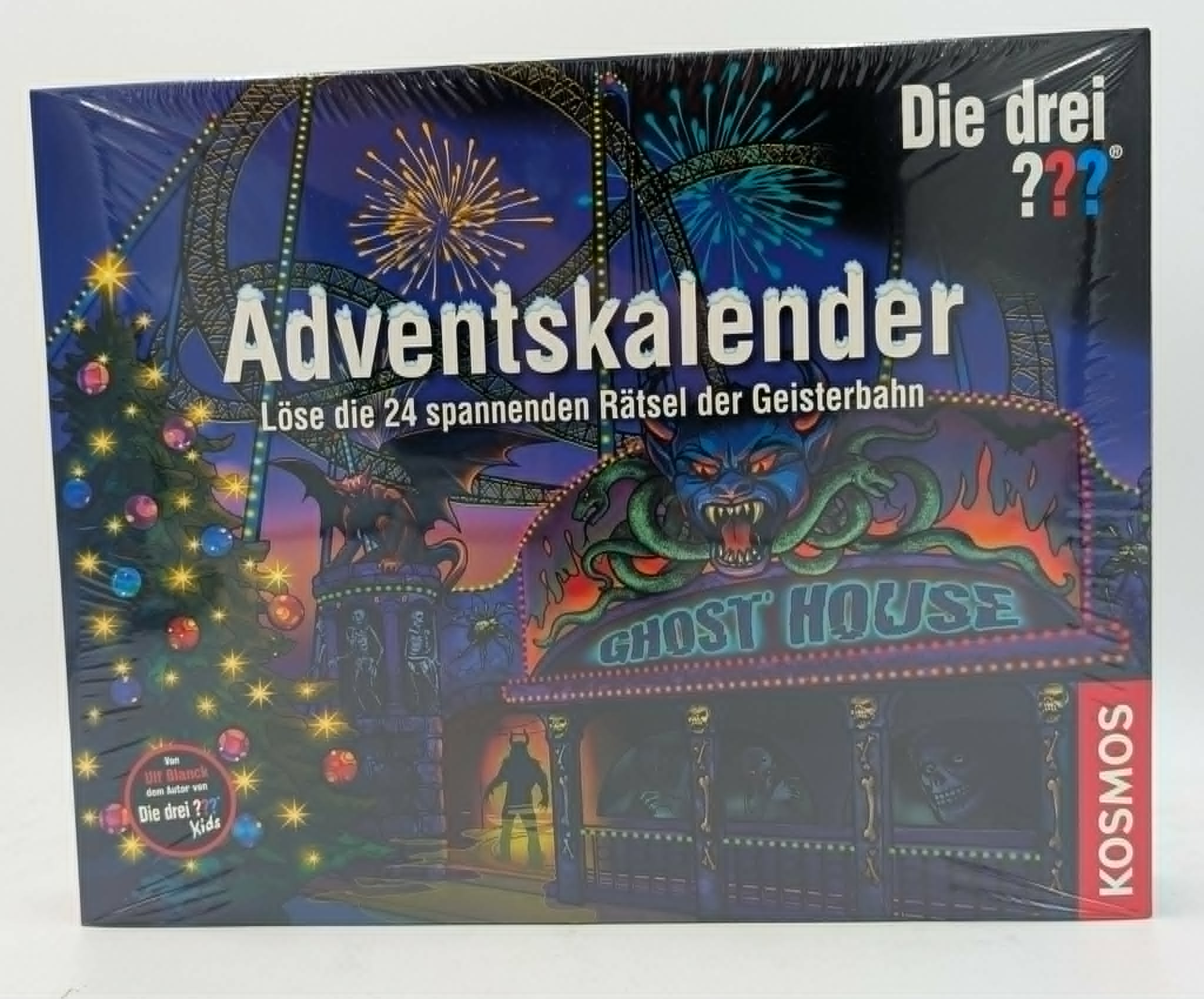 Die drei Fragezeichen Adventskalender mit Geisterbahn-Design, bunten Lichtern, Feuerwerk und gruseligen Figuren.