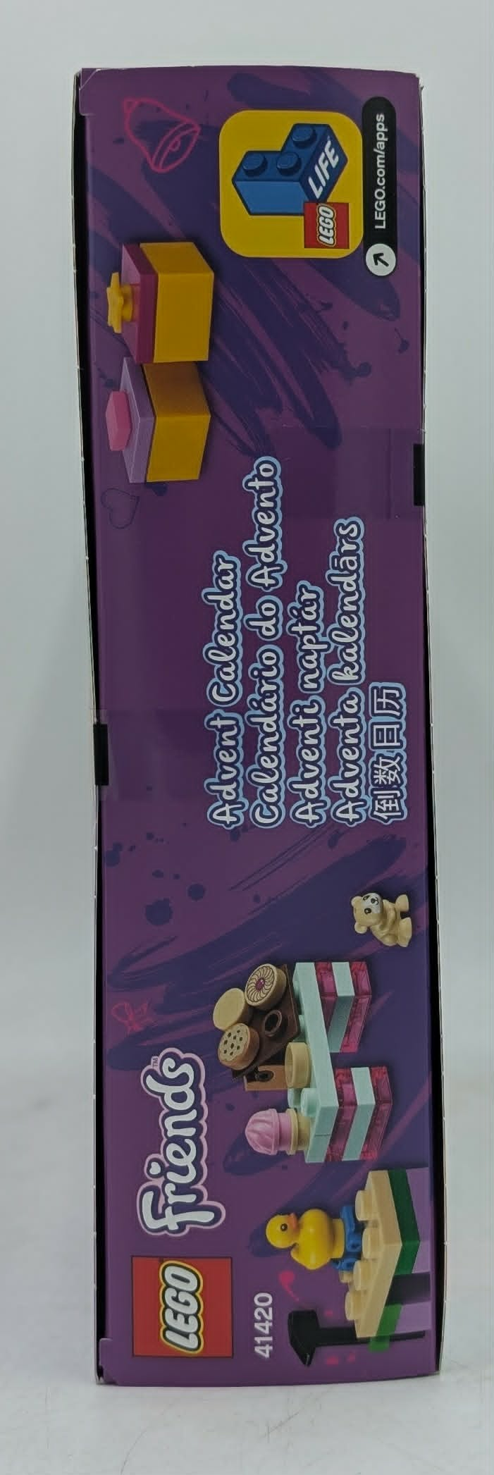 Lego Friends Adventskalender Box, Seitenansicht mit bunten LEGO Steinen, Figuren und mehrsprachigem Text.