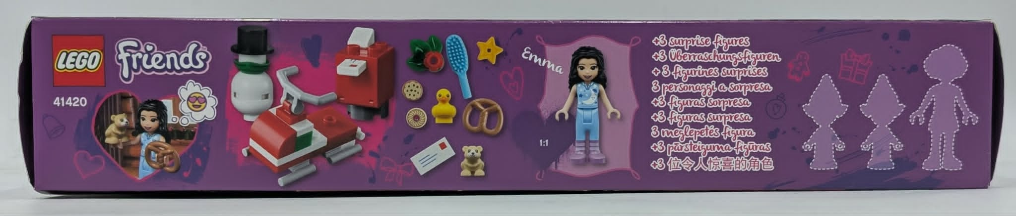 Lego Friends 41420 Schachtelseite mit Spielfigur, Schneemobil, Schneemann und Zubehör auf lila Hintergrund.