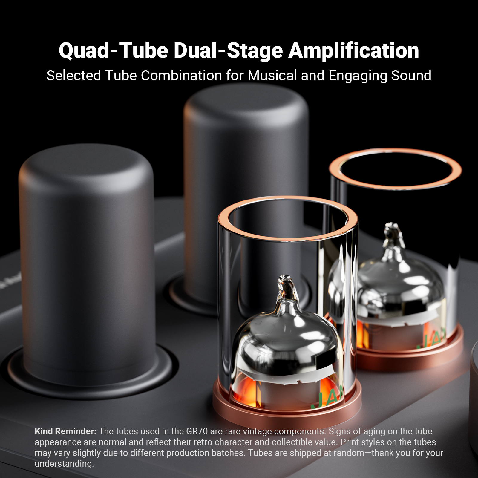 Close-up of audio amplifier with four tubes, two covered and two glowing inside glass guards against a dark background.
