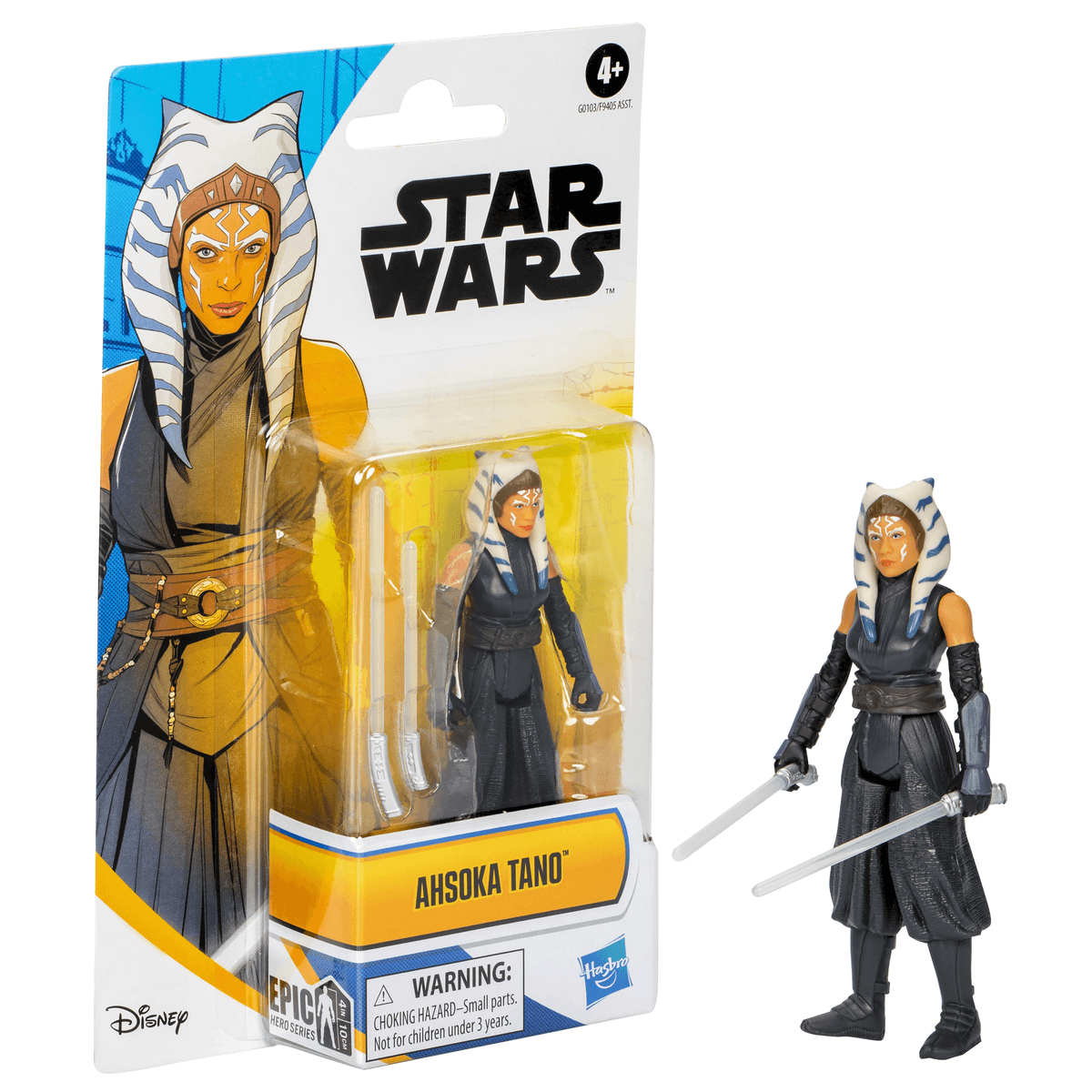 Action figure di Ahsoka Tano di Star Wars con due spade laser bianche nella confezione e in piedi accanto.