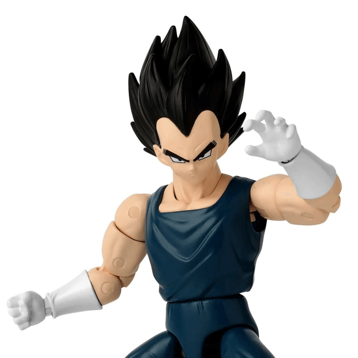 Actionfigur von Vegeta mit schwarzem Haar, dunkelblauem Anzug und weißen Handschuhen in Kampfpose.