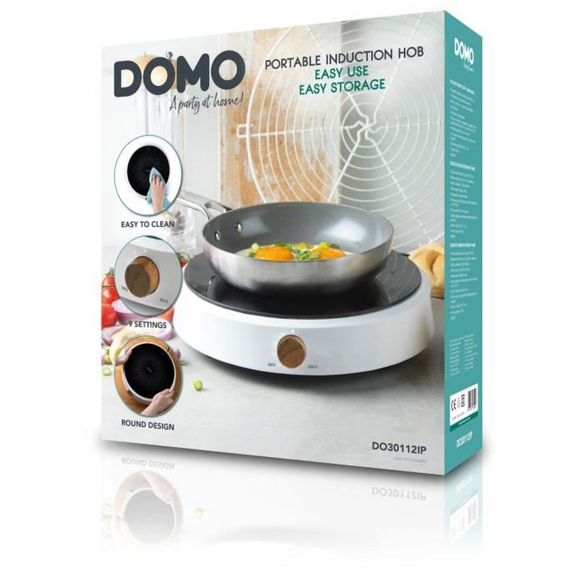 Produktverpackung eines weißen Domo tragbaren Induktionskochfelds mit Bratpfanne und Ei.