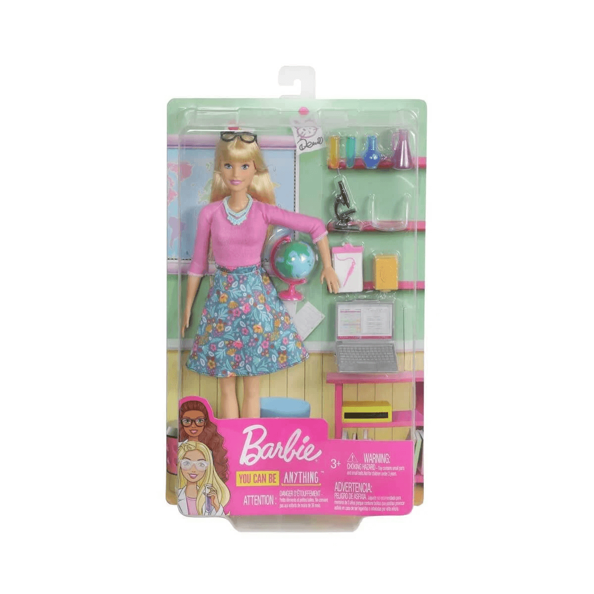 Barbie-Puppe als Wissenschaftlerin in Verpackung mit Zubehör wie Laptop, Globus, Mikroskop und Reagenzgläsern.