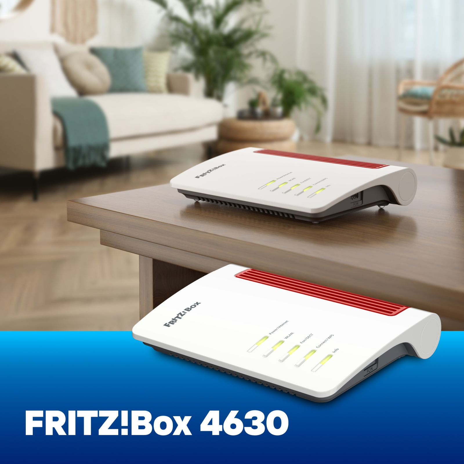 Due router FRITZ!Box 4630 su un tavolo di legno in un soggiorno, con la scritta FRITZ!Box 4630.