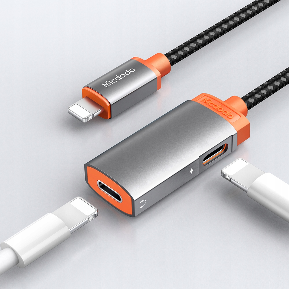Grau-oranger Mcdodo 2-in-1-Audio- und Ladeadapter mit geflochtenem Kabel und zwei weißen Steckern.