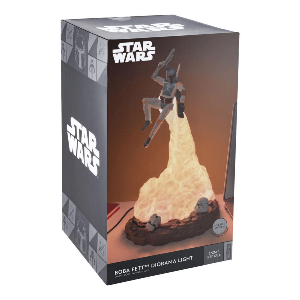 Lámpara de diorama Star Wars Boba Fett en su caja, mostrando una escena de humo de cohete iluminada con dos cascos.