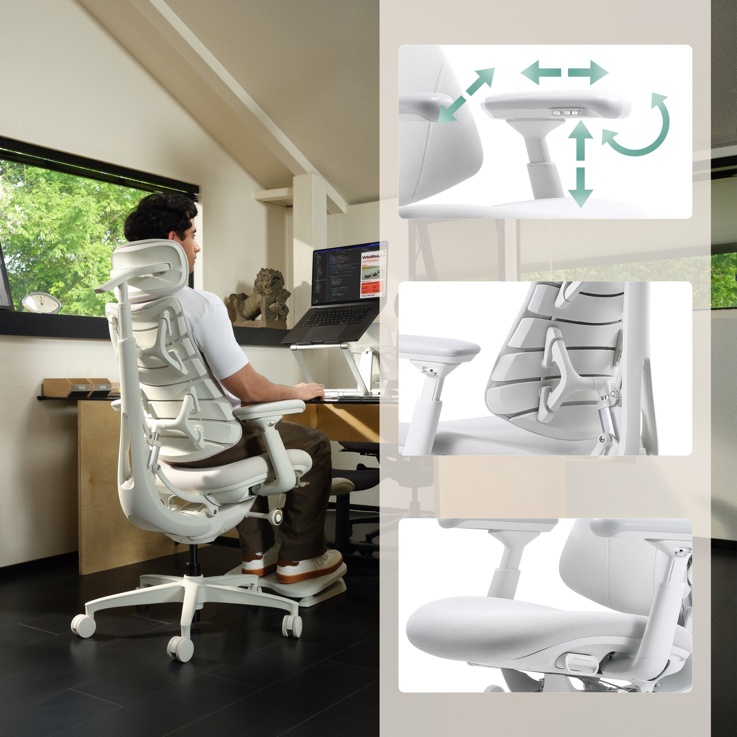 Un uomo siede a una scrivania su una sedia ergonomica bianca con braccioli regolabili.